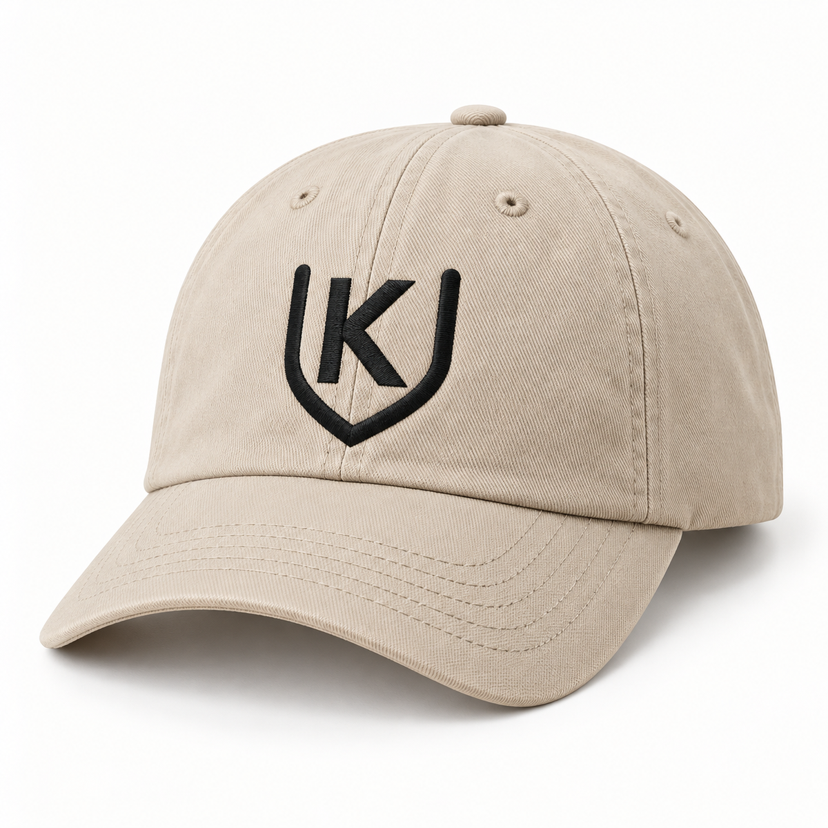 Stone six-panel cap with a curved visor and black K-shield embroidery on the front crown.