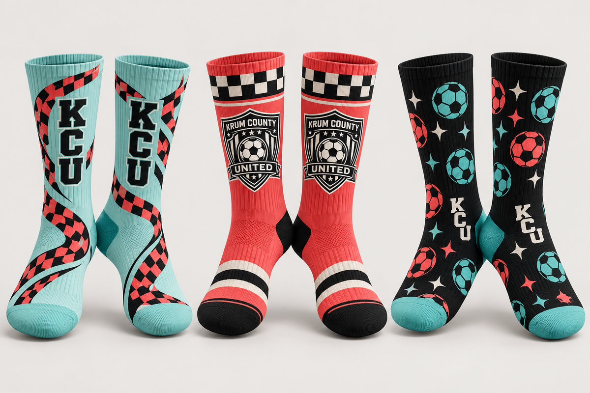Three pairs of Krum crew socks in teal, coral, and black with checker patterns and KCU branding