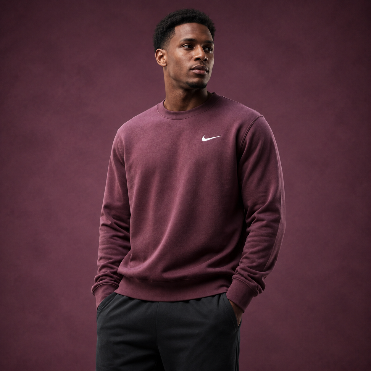 Athletic model wearing the FCTR Apparel Nike Men's Club Fleece Crew
